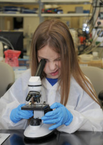 girl doing science