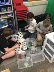 student building robots